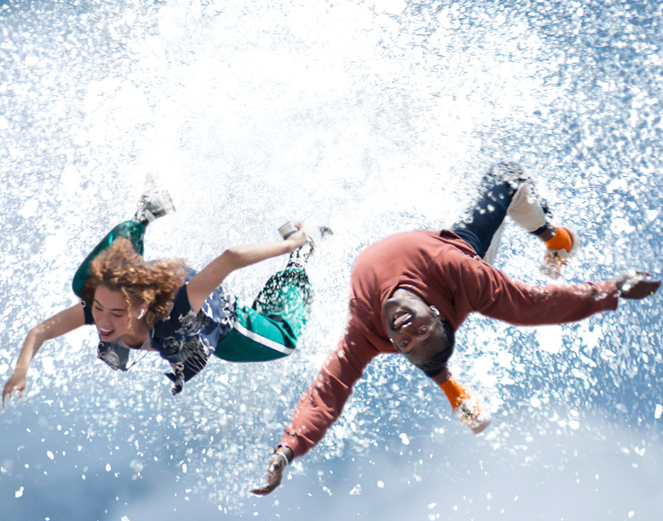 image of two people in the water with ipod